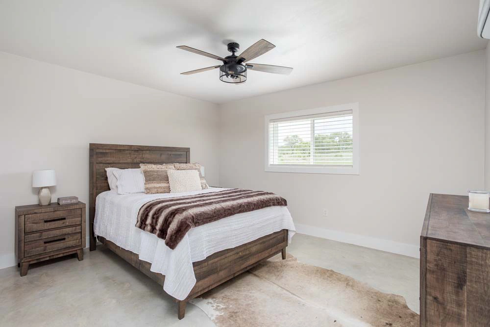 Modern bedroom with wooden bed